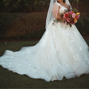 Martina Liana wedding gown in color Biscotti with Ivory Tulle.
